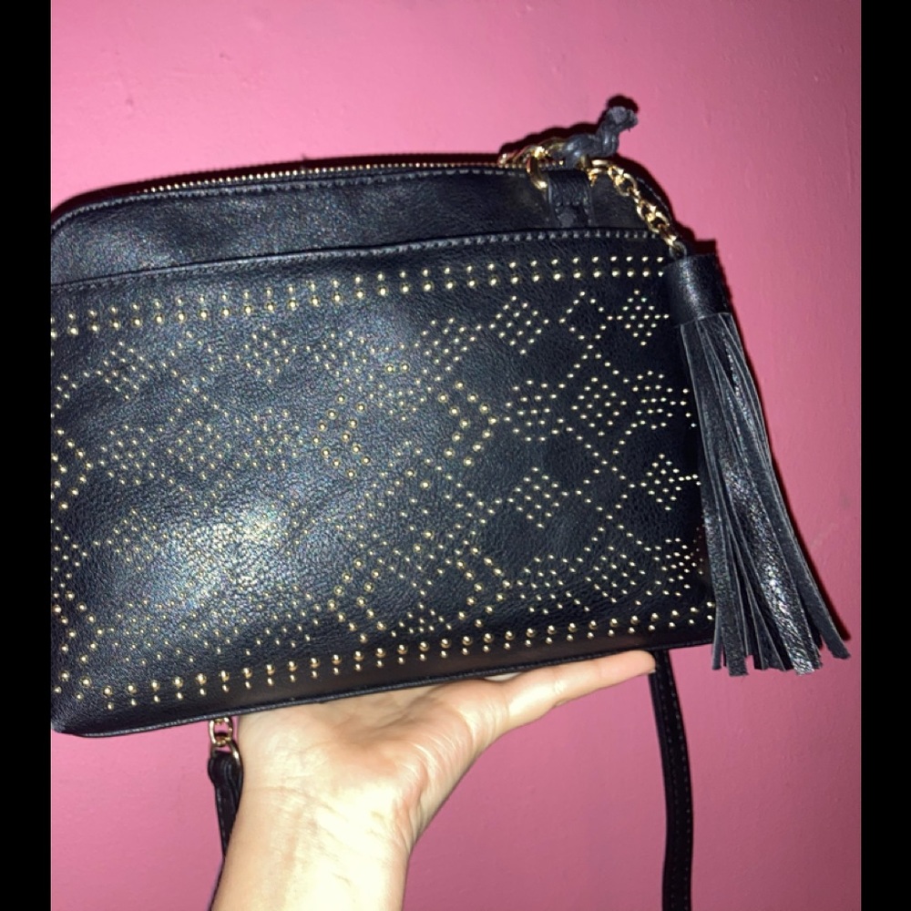 Black leather purse with gold detailing